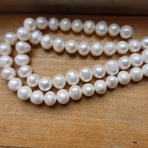 AA+ high luster 11-12mm round freshwater pearls