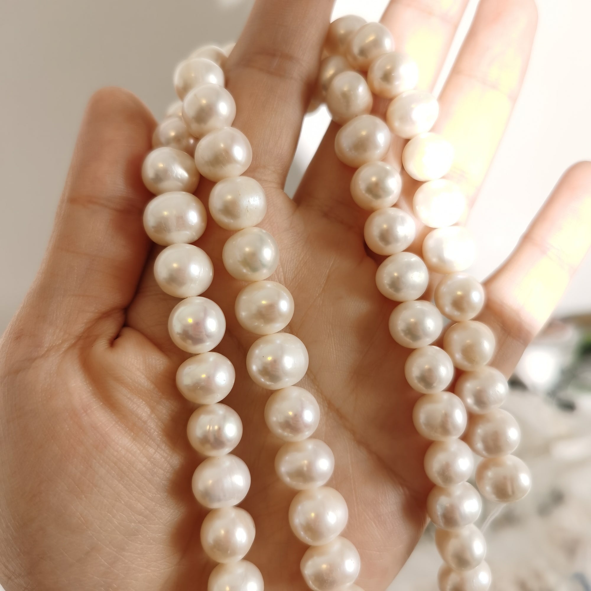 AA+ high luster 11-12mm round freshwater pearls