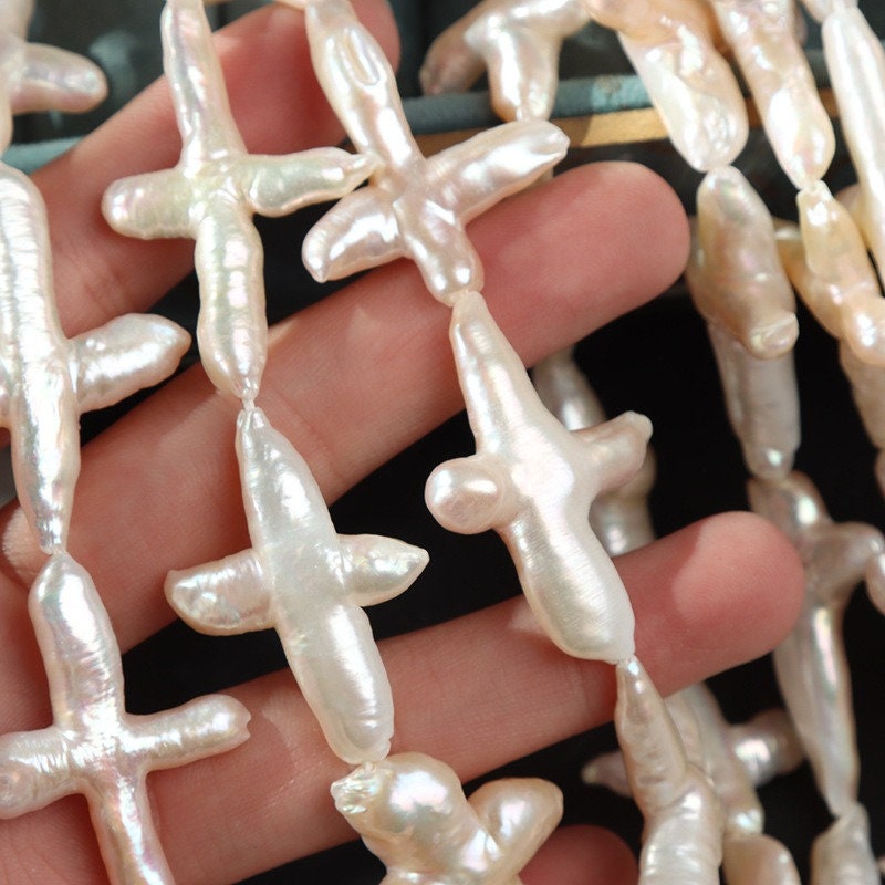 4A 20-30mm Baroque cross pearl strand