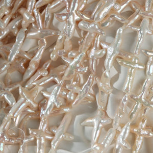 4A 20-30mm Baroque cross pearl strand