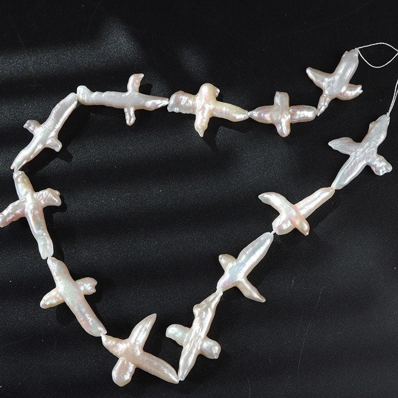 4A 20-30mm Baroque cross pearl strand