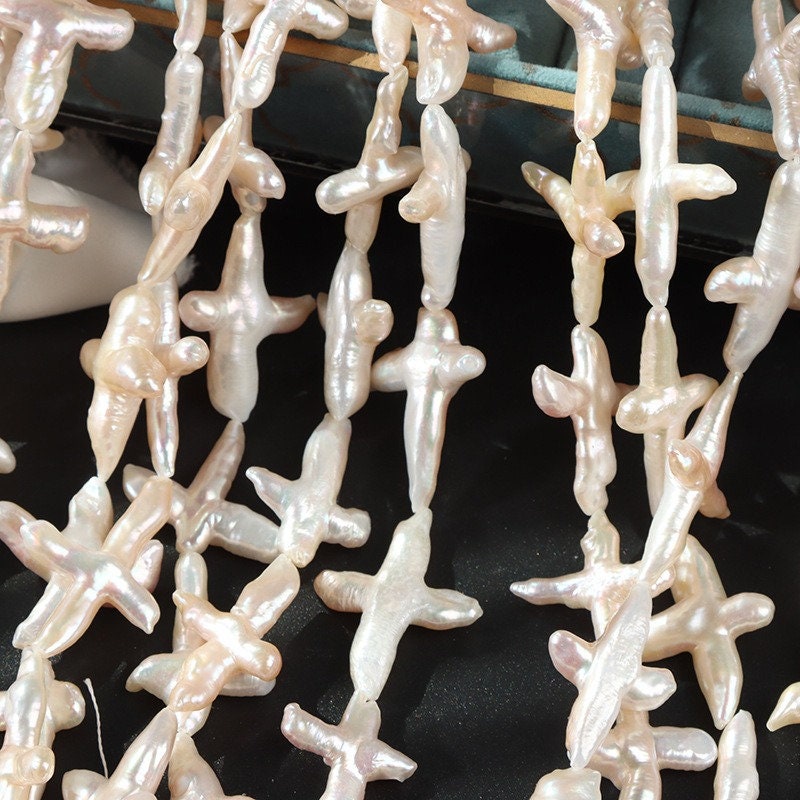 4A 20-30mm Baroque cross pearl strand