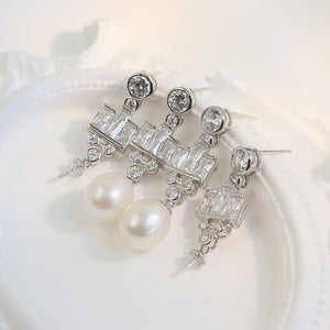 sterling silver pearl earrings queen style setting
