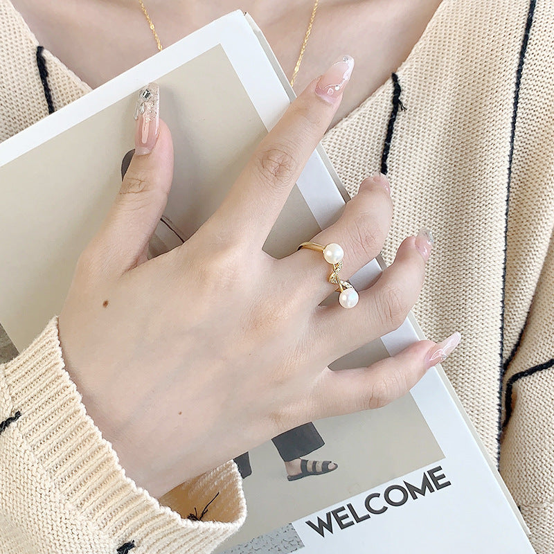 Waving balance beam pearl ring setting