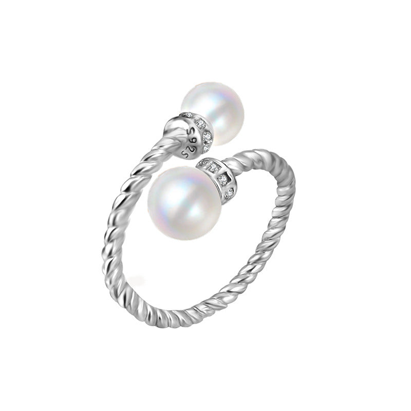 Twisted pearl ring setting