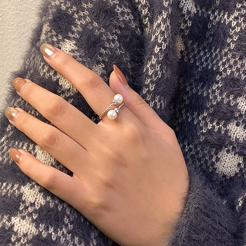 Twisted pearl ring setting