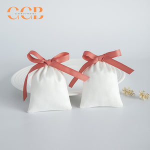 20pcs white jewelry pouch with pink bow, luxury drawstring gift bags for rings earrings necklaces, elegant jewelry packaging set