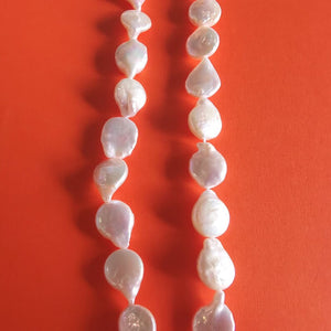12mm white large baroque pearl coin with tail strand