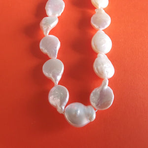 12mm white large baroque pearl coin with tail strand