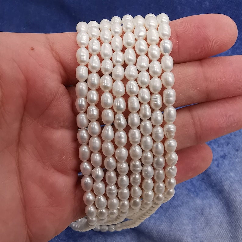AA 5-6mm white oval freshwater rice pearls