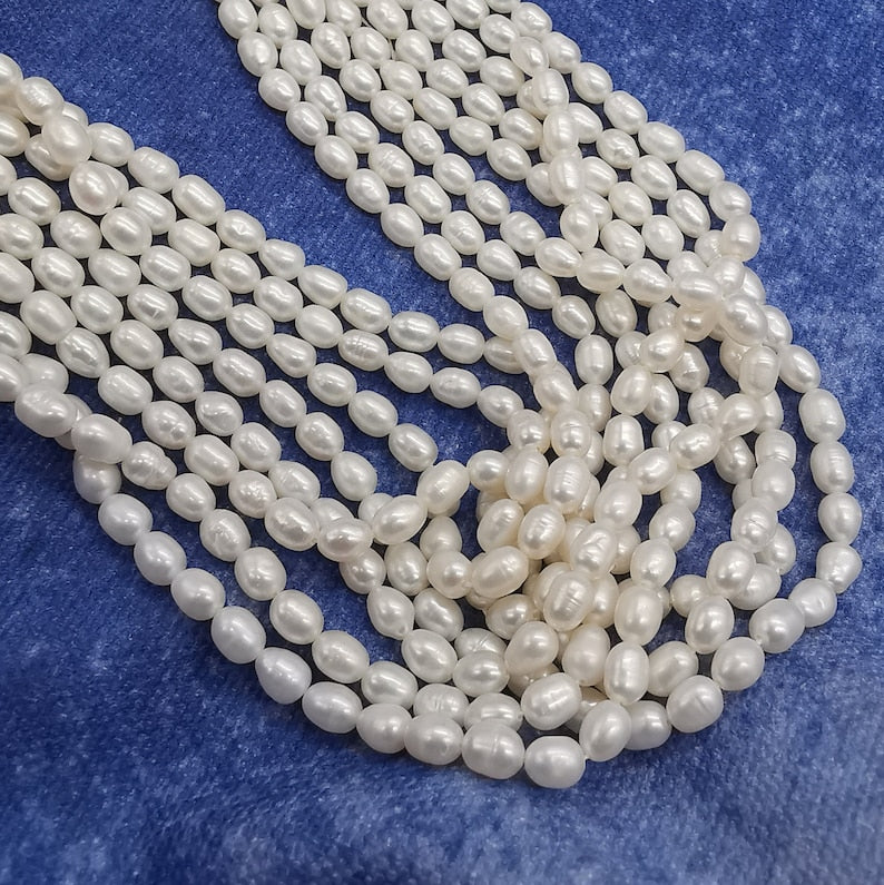AA 5-6mm white oval freshwater rice pearls