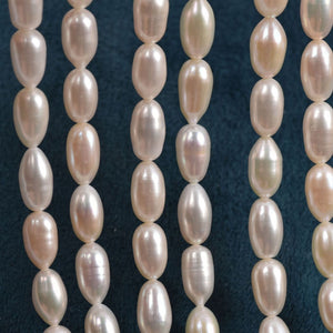 AAA 7*11mm strip drop-shaped white rice pearl strand