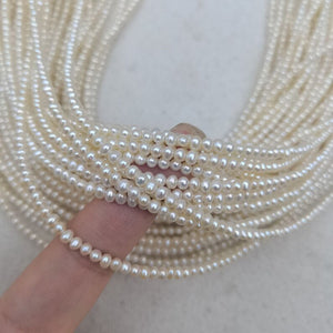 AA 3-3.5mm nearly round white pearl strand