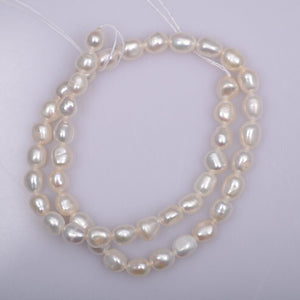 AA 7-8mm oval nugget white pearl
