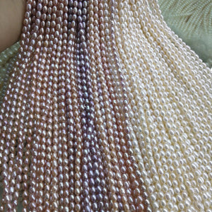 5-6mm high luster white rice pearl strand