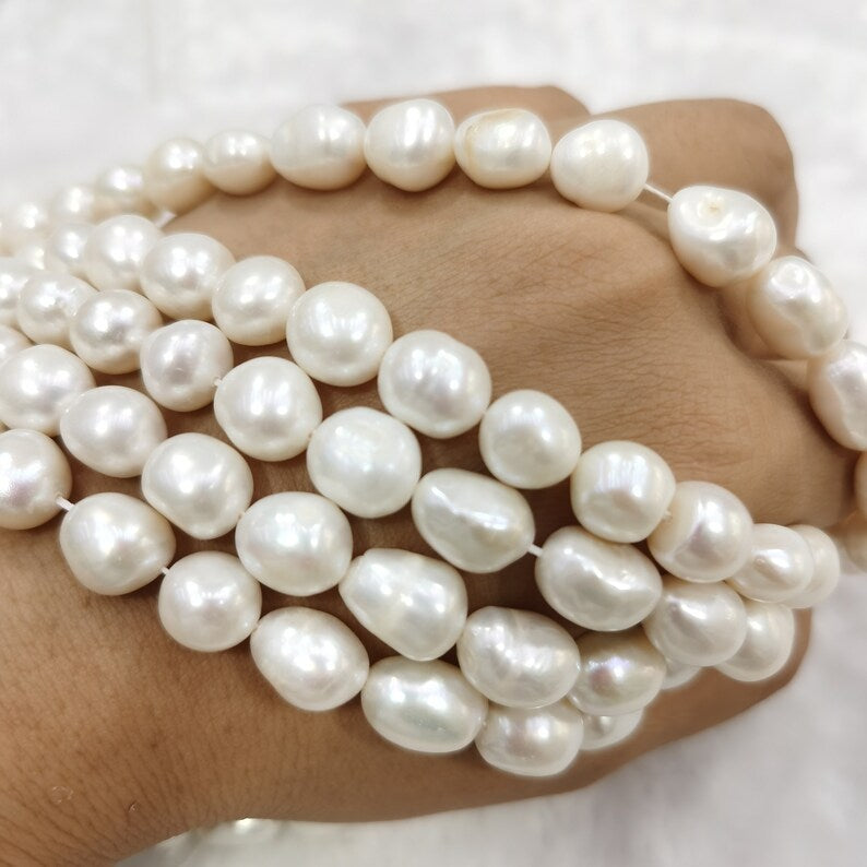 AA+ 7-9mm oval nugget white pearl