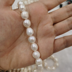 AA+ 7-9mm oval nugget white pearl