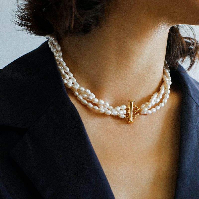 Three-layer rice pearl necklace